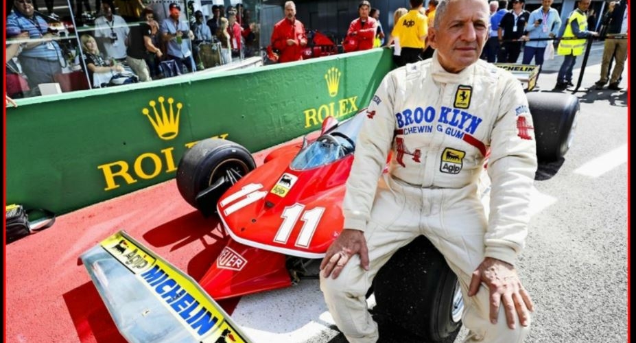 Jodi Schekter by a racing car